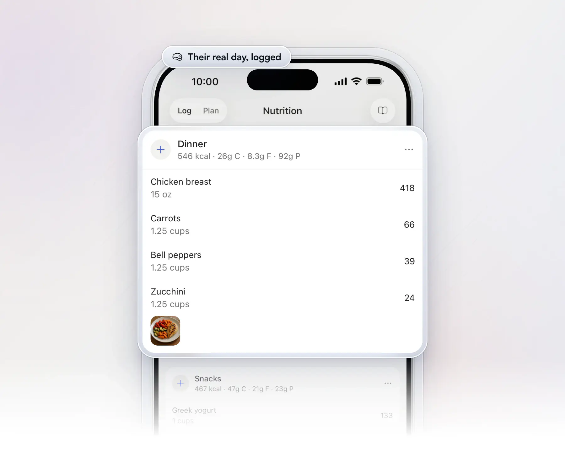A client's food log in the HubFit app on an iPhone, with the Dinner meal lifted out: 546 calories, chicken breast, carrots, bell peppers and zucchini, and a photo of the plate