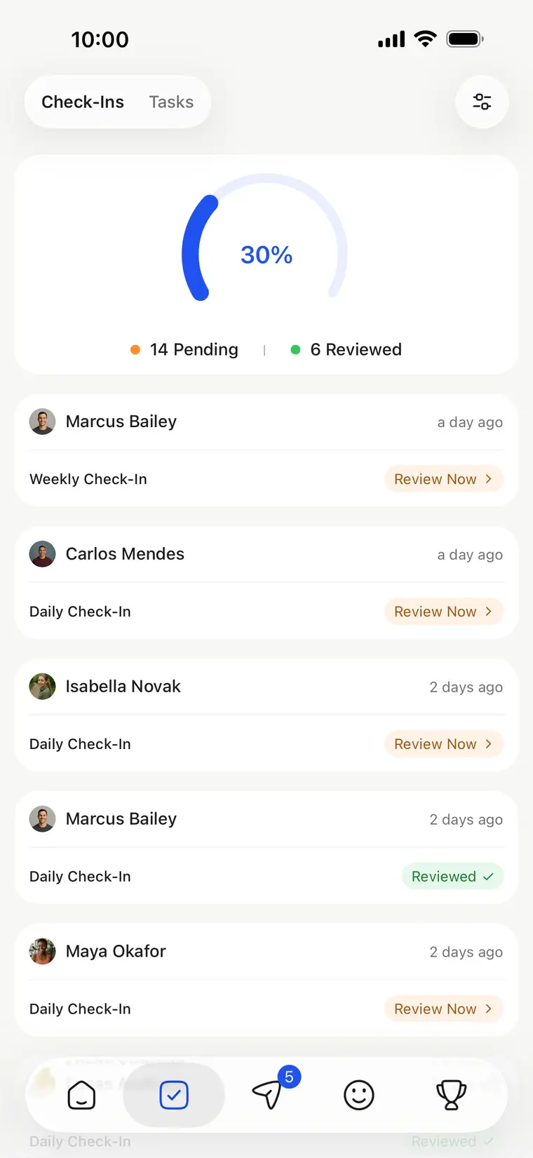 The coach's check-in review inbox: pending and reviewed check-ins by client