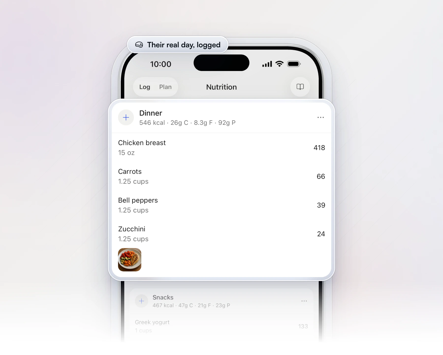 A client's food log in the HubFit app on an iPhone, with the Dinner meal lifted out: 546 calories, chicken breast, carrots, bell peppers and zucchini, and a photo of the plate